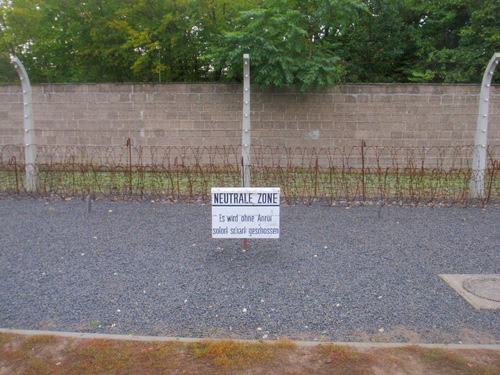 Views of the barbed wire fence, wall, and nuetral zone.